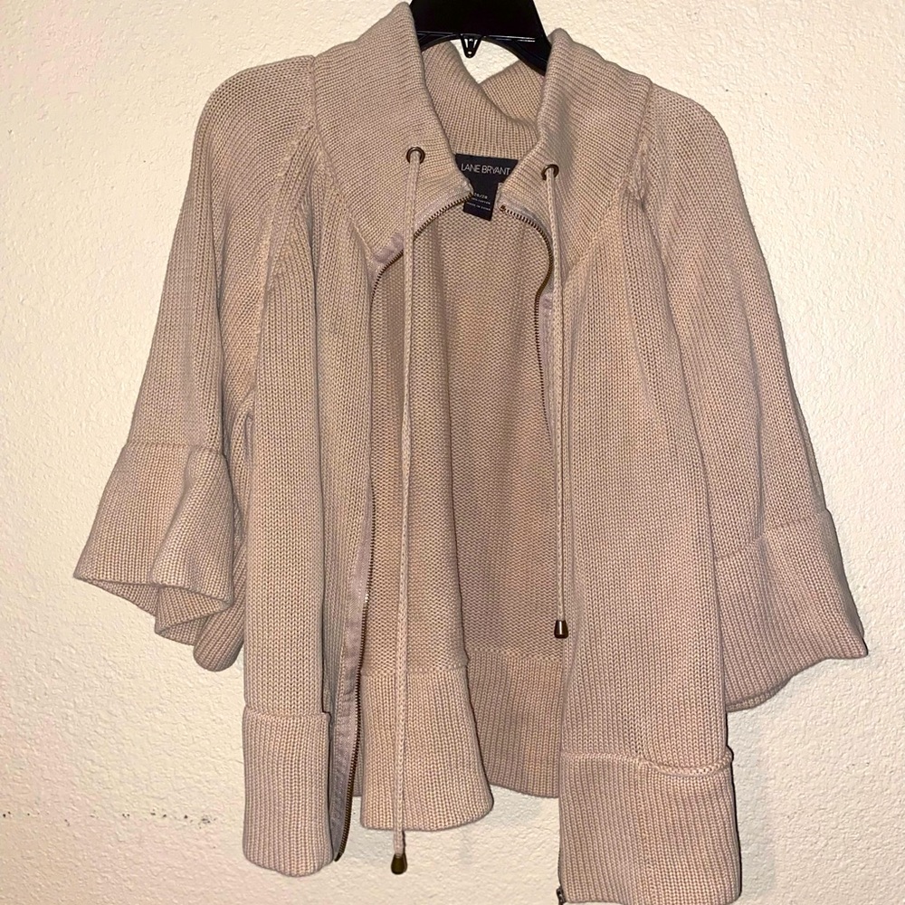 Tan jacket.